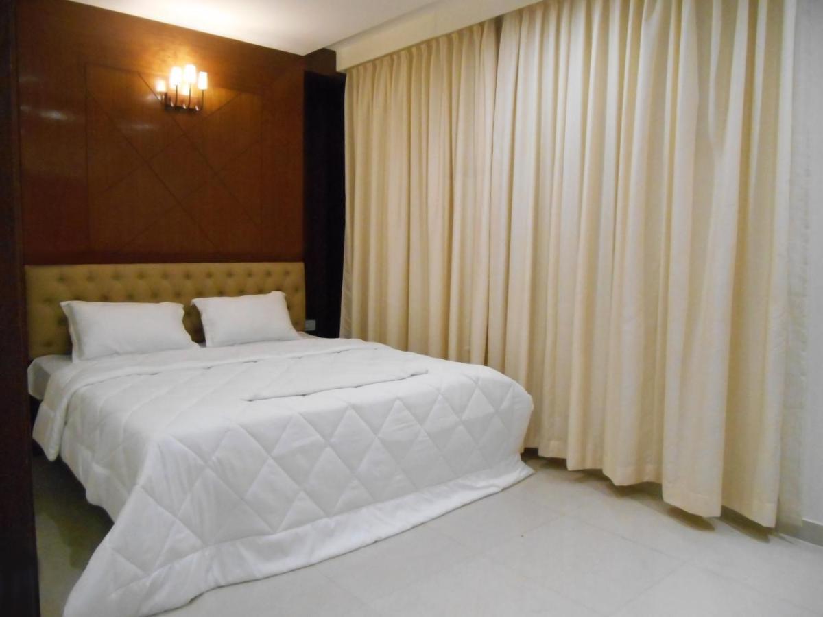 The Grand Coral Hotell Bangalore Exteriör bild